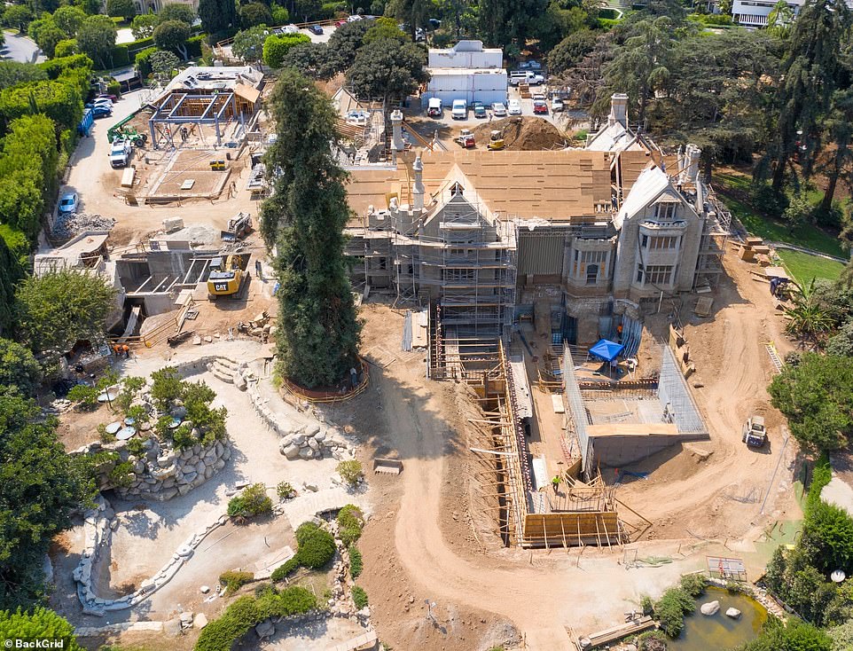 An image taken at the back of the property shows new foundations being dug behind the mansion which was sold for $100million in 2016