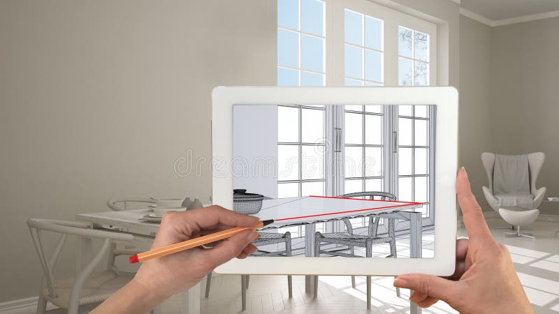 Hands holding and drawing on tablet showing classic kitchen, dining table laid for two, parquet, CAD sketch. Real finished interio. R background, architecture royalty free stock photos