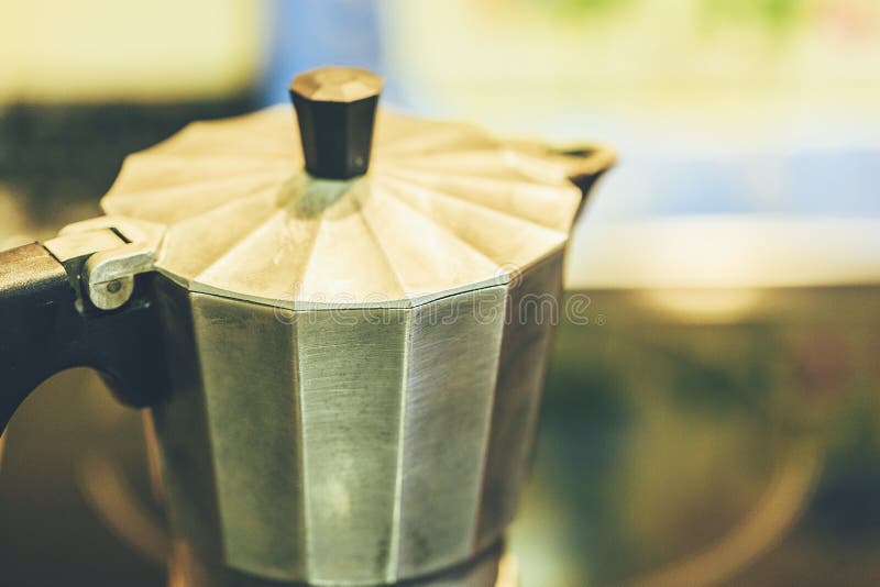 Stainless classic cofee machine in he kitchen.  stock image