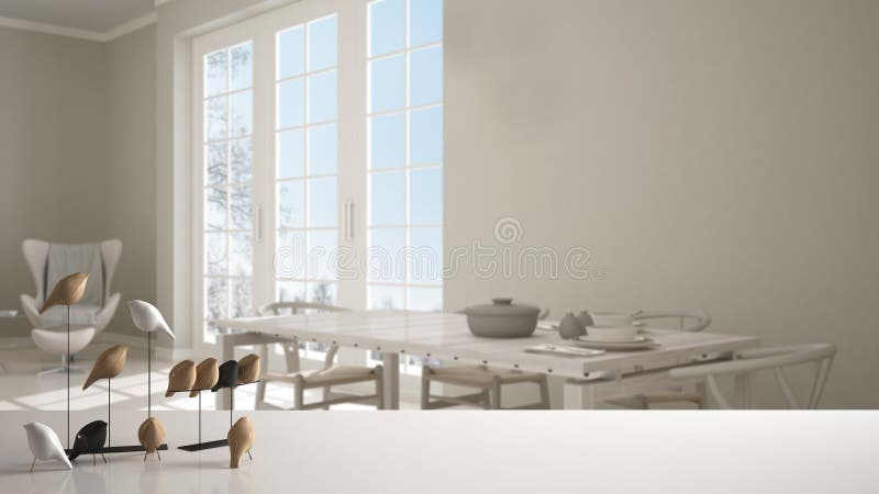 White table top or shelf with minimalistic bird ornament, birdie knick - knack over blurred classic kitchen with dining table laid. For two, big panoramic royalty free stock photo